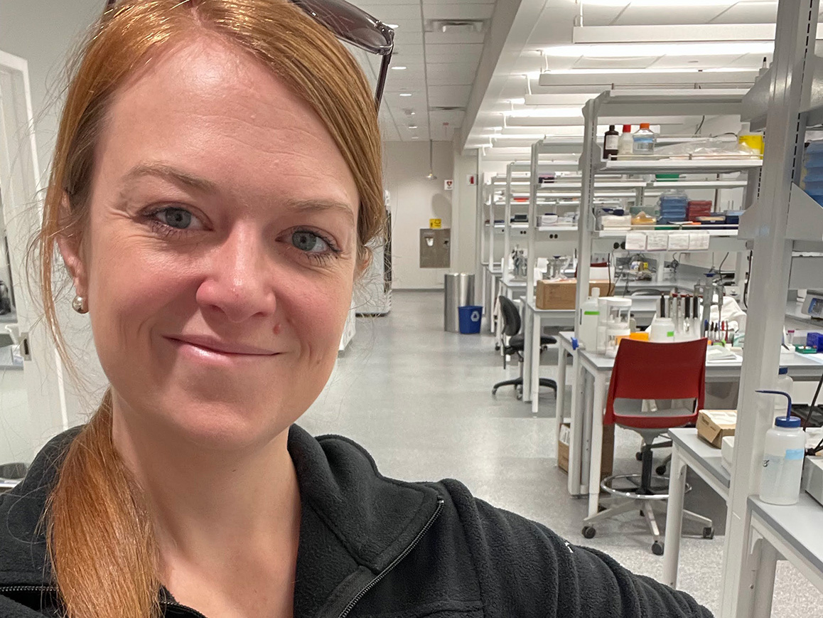 Heather Caslin standing in a lab